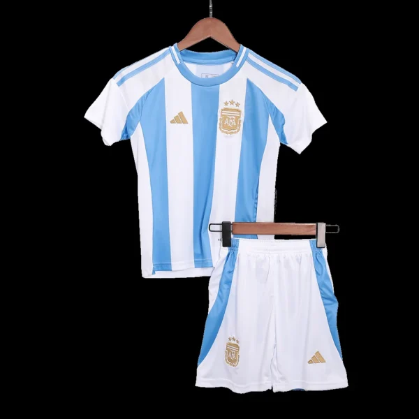 kid-s-argentina-home-soccer-kit-jersey-shorts-fan-version-03 Kid’s Argentina Home Soccer Kit β Jersey + Shorts β Fan Version β front view