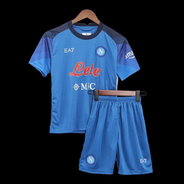 kid-s-napoli-home-soccer-kit-jersey-shorts-2022-23-fan-version-193796-01 Kid’s Napoli Home Soccer Kit β Jersey + Shorts 2022/23 β Fan Version β front view